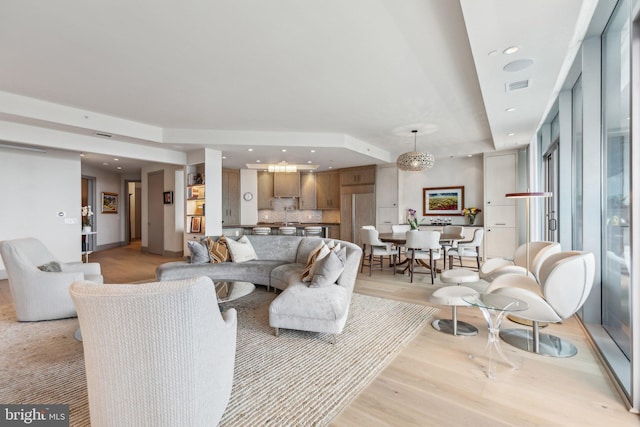 1881 N Nash St Unit 2309, Arlington, VA 22209 - living area with light wood-style floors and recessed lighting
