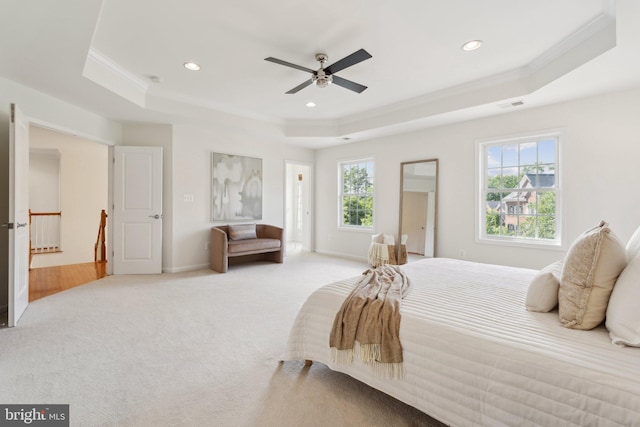 42322 Rising Moon Pl, Brambleton, VA 20148 - carpeted bedroom with a raised ceiling, crown molding, recessed lighting, ceiling fan, and baseboards