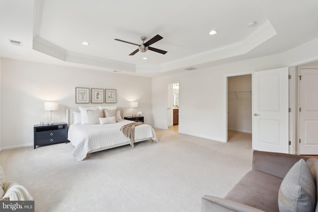 42322 Rising Moon Pl, Brambleton, VA 20148 - bedroom featuring a tray ceiling, light carpet, recessed lighting, baseboards, and a spacious closet