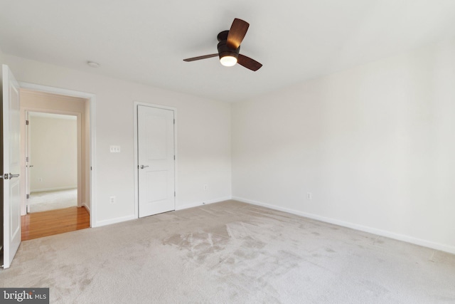 42322 Rising Moon Pl, Brambleton, VA 20148 - unfurnished bedroom featuring carpet, baseboards, and ceiling fan