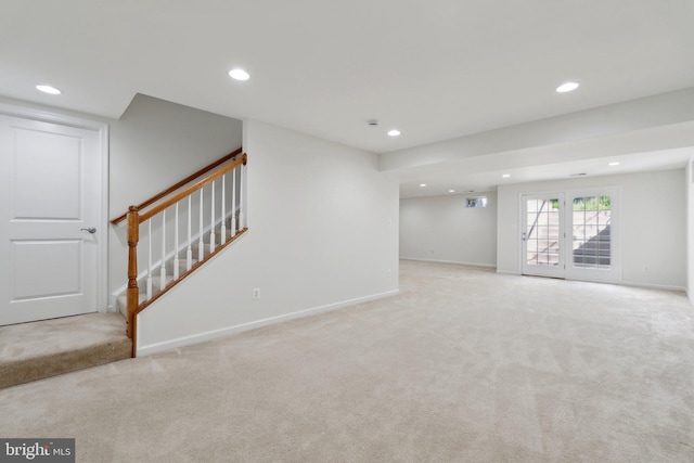 42322 Rising Moon Pl, Brambleton, VA 20148 - unfurnished living room with stairway, carpet floors, recessed lighting, and baseboards