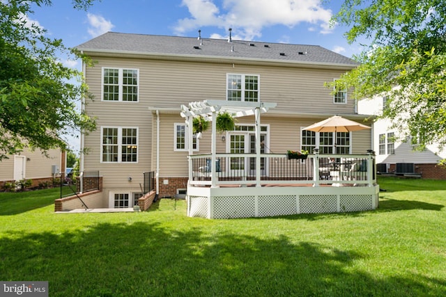 42322 Rising Moon Pl, Brambleton, VA 20148 - back of house featuring a pergola, a yard, central AC, and a wooden deck