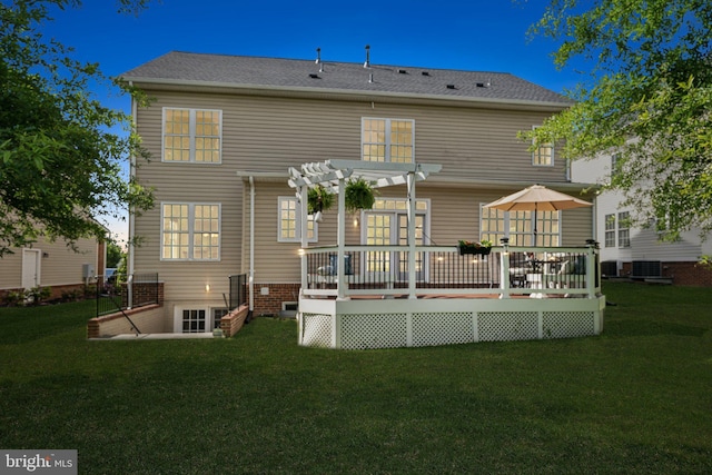 42322 Rising Moon Pl, Brambleton, VA 20148 - rear view of property with a pergola, a wooden deck, a yard, and central AC