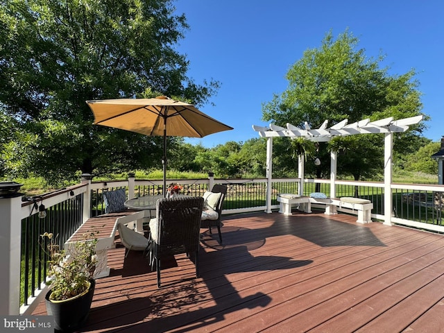 42322 Rising Moon Pl, Brambleton, VA 20148 - wooden terrace featuring outdoor dining area and a pergola