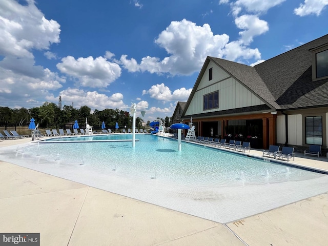 42322 Rising Moon Pl, Brambleton, VA 20148 - community pool featuring a patio area