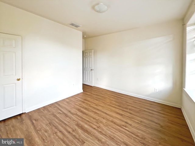 2426 Jefferson St, Baltimore, MD 21205 - unfurnished room featuring wood finished floors and baseboards