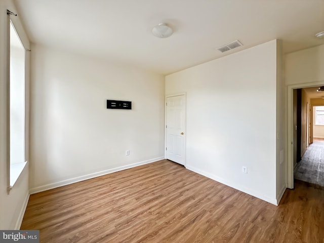 2426 Jefferson St, Baltimore, MD 21205 - empty room with wood finished floors and baseboards