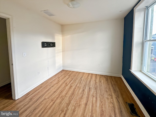 2426 Jefferson St, Baltimore, MD 21205 - empty room featuring light wood-type flooring and baseboards