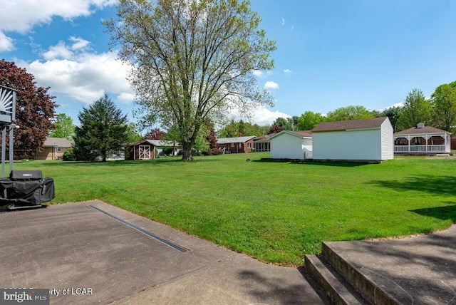 691 Harvey St, West Hazleton, PA 18202 - view of green lawn with a shed and an outdoor structure