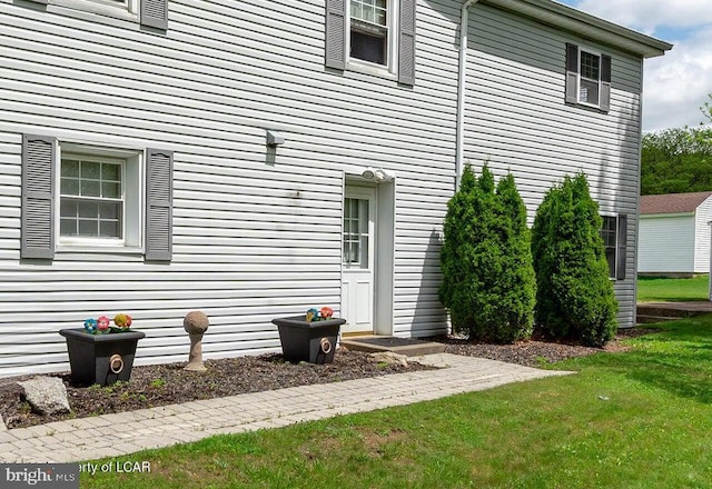 691 Harvey St, West Hazleton, PA 18202 - view of side of home featuring a lawn