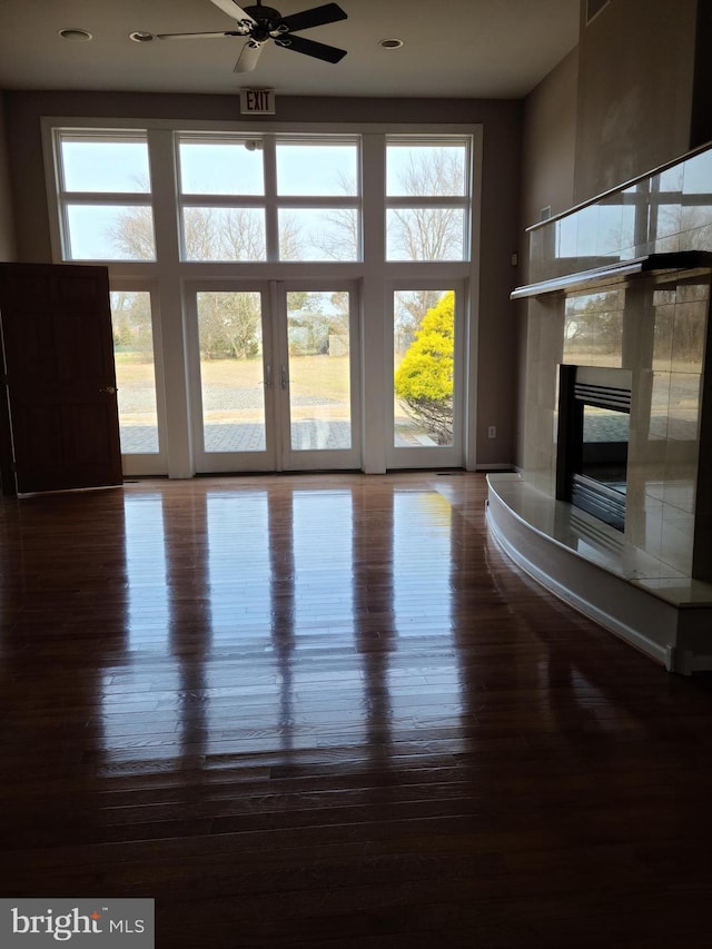364 Swedesboro Rd, Mullica Hill, NJ 08062 - unfurnished living room featuring a ceiling fan, plenty of natural light, hardwood / wood-style floors, a towering ceiling, and recessed lighting