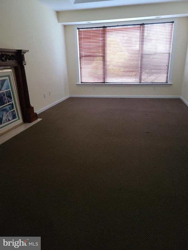 364 Swedesboro Rd, Mullica Hill, NJ 08062 - unfurnished living room featuring carpet flooring and baseboards