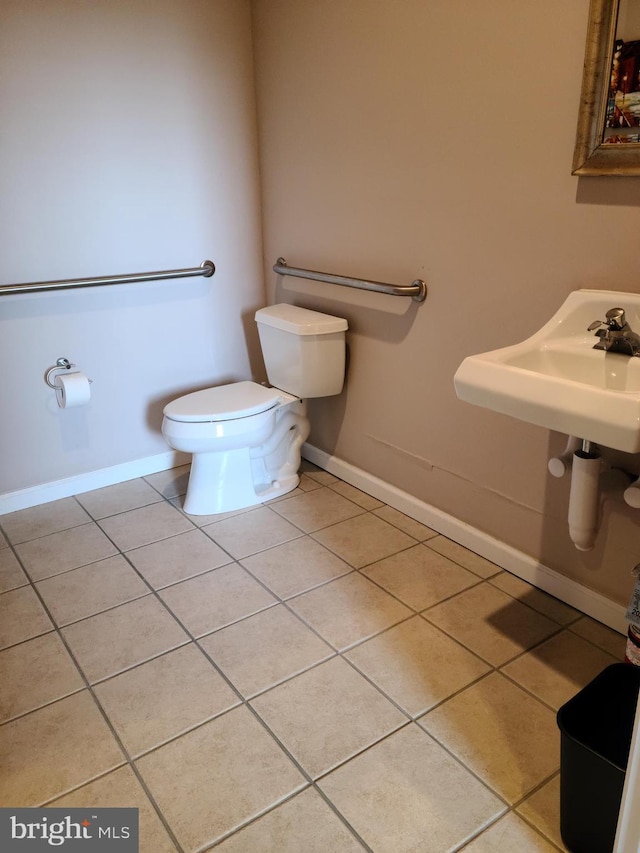 364 Swedesboro Rd, Mullica Hill, NJ 08062 - bathroom with tile patterned flooring, toilet, and baseboards