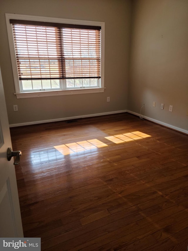 364 Swedesboro Rd, Mullica Hill, NJ 08062 - unfurnished room featuring plenty of natural light, wood finished floors, and baseboards