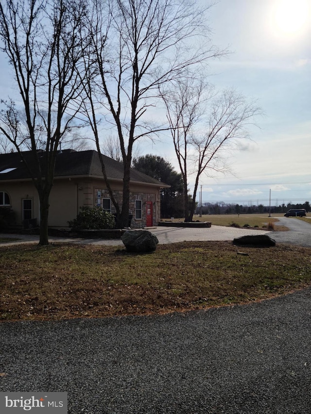 364 Swedesboro Rd, Mullica Hill, NJ 08062 - view of front of house featuring driveway and stone siding