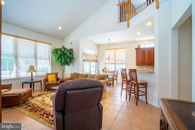 6 Galileo Dr, Cranbury, NJ 08512 - living room featuring high vaulted ceiling, a chandelier, recessed lighting, and light tile patterned flooring