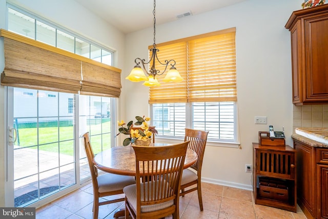 6 Galileo Dr, Cranbury, NJ 08512 - dining space featuring a chandelier and baseboards