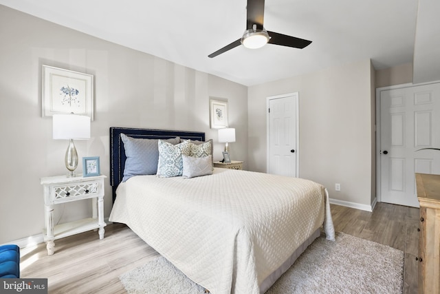 5050 7th Rd S Unit 201, Arlington, VA 22204 - bedroom with wood finished floors, baseboards, and ceiling fan