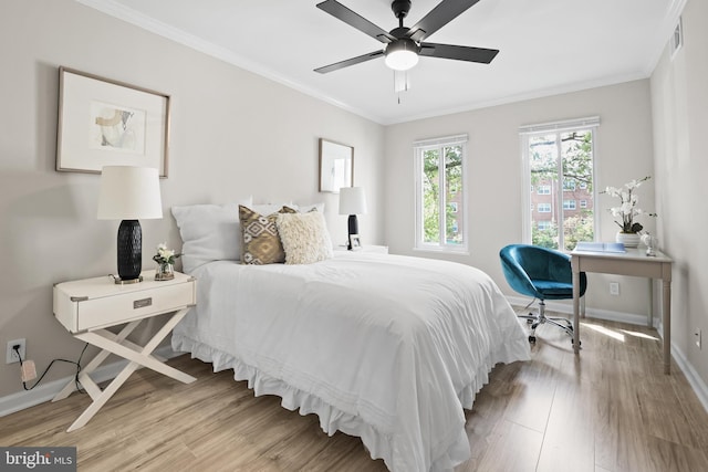 5050 7th Rd S Unit 201, Arlington, VA 22204 - bedroom featuring wood finished floors, baseboards, crown molding, and a ceiling fan