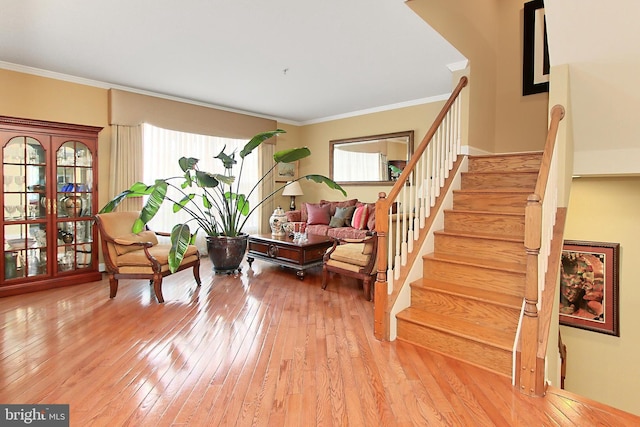 120 Fortnightly Blvd, Herndon, VA 20170 - living room with stairs, wood-type flooring, and ornamental molding