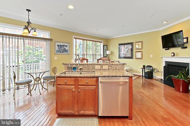 120 Fortnightly Blvd, Herndon, VA 20170 - kitchen featuring dishwasher, a sink, light wood-type flooring, ornamental molding, and healthy amount of natural light