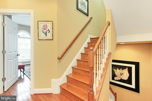 120 Fortnightly Blvd, Herndon, VA 20170 - stairs featuring wood finished floors and baseboards