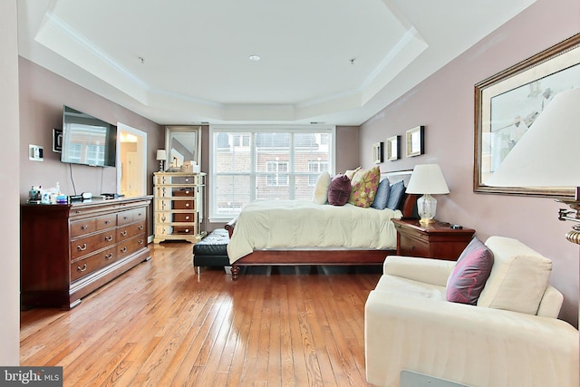120 Fortnightly Blvd, Herndon, VA 20170 - bedroom featuring a tray ceiling, light wood finished floors, and crown molding