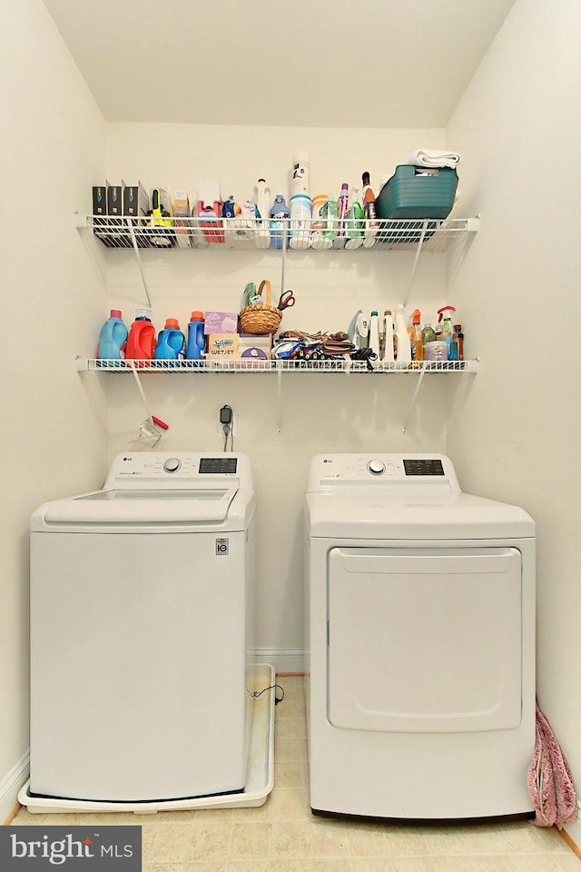 120 Fortnightly Blvd, Herndon, VA 20170 - laundry room featuring washer and dryer and baseboards