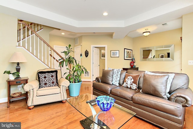 120 Fortnightly Blvd, Herndon, VA 20170 - living area featuring wood finished floors, stairs, recessed lighting, and baseboards