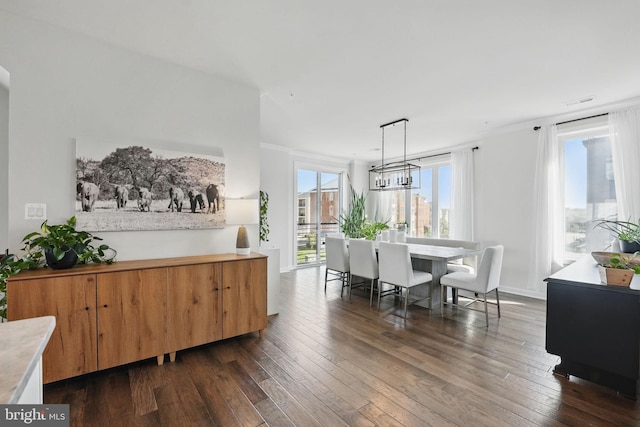dining room with dark wood finished floors