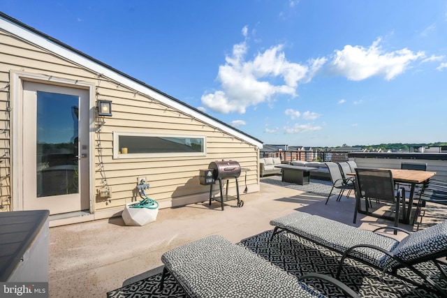 view of patio / terrace featuring outdoor lounge area, a grill, and outdoor dining space