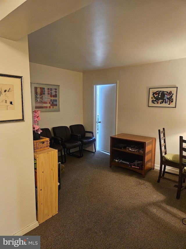 5410 Connecticut Ave NW Unit 112, Washington, DC 20015 - carpeted living room featuring baseboards