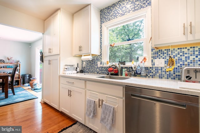 618 Chapelgate Dr, Odenton, MD 21113 - kitchen with dishwasher, a sink, and white cabinets