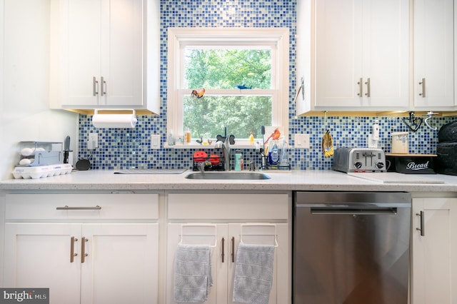 618 Chapelgate Dr, Odenton, MD 21113 - kitchen with dishwasher, a sink, white cabinets, and decorative backsplash