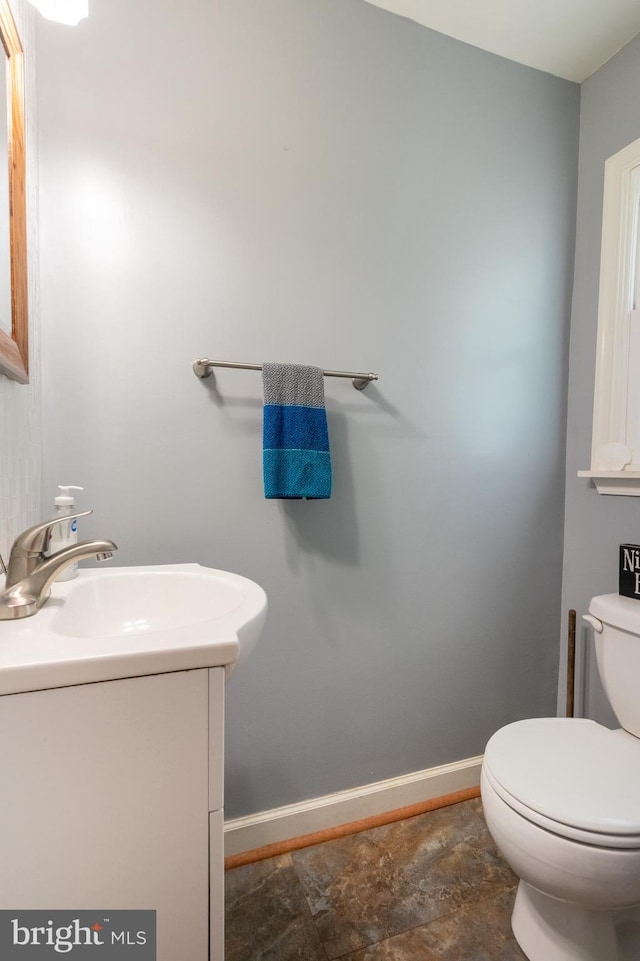 618 Chapelgate Dr, Odenton, MD 21113 - bathroom with vanity, toilet, and baseboards