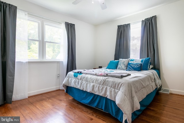 618 Chapelgate Dr, Odenton, MD 21113 - bedroom featuring baseboards, wood finished floors, and a ceiling fan
