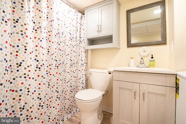 618 Chapelgate Dr, Odenton, MD 21113 - bathroom with vanity, toilet, a shower with shower curtain, and wood finished floors