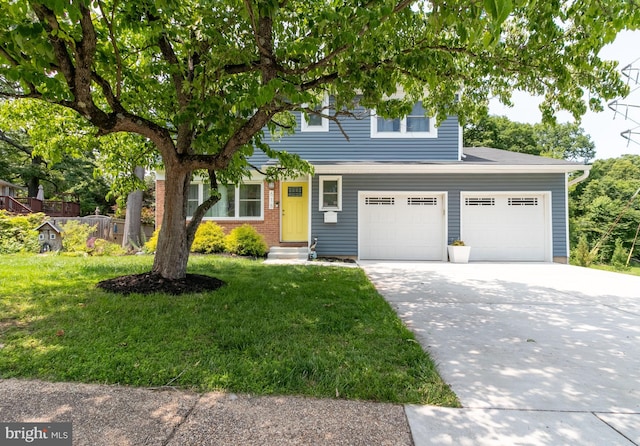 618 Chapelgate Dr, Odenton, MD 21113 - view of property hidden behind natural elements featuring driveway, a front lawn, a garage, and entry steps