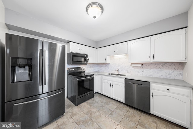 355 Westridge Cir Unit 128, Phoenixville, PA 19460 - kitchen featuring appliances with stainless steel finishes, a sink, white cabinets, and light countertops