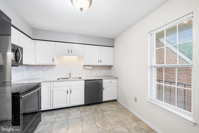 355 Westridge Cir Unit 128, Phoenixville, PA 19460 - kitchen with stainless steel appliances, a sink, white cabinets, and light countertops
