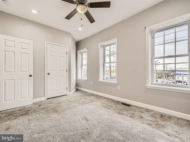 905 E Patapsco Ave, Baltimore, MD 21225 - unfurnished bedroom with carpet, baseboards, recessed lighting, and a ceiling fan