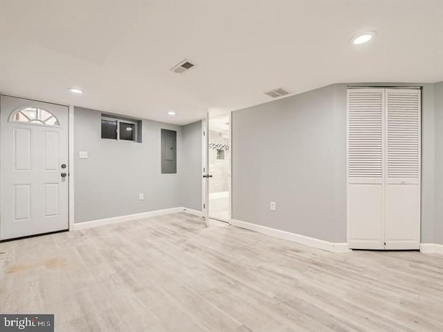 905 E Patapsco Ave, Baltimore, MD 21225 - entrance foyer featuring electric panel, baseboards, light wood-type flooring, and recessed lighting