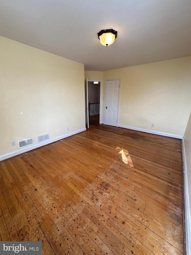 409 Whitfield Rd, Baltimore, MD 21228 - unfurnished room with baseboards and hardwood / wood-style flooring