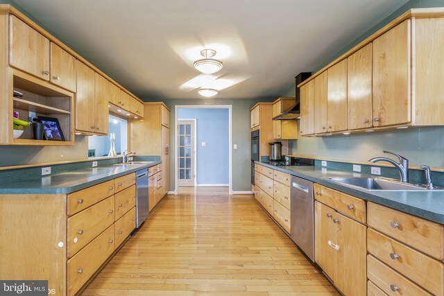 2400 Willow Glen Dr, Baltimore, MD 21209 - kitchen with stainless steel dishwasher, a sink, and light wood-type flooring