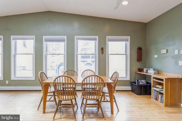 2400 Willow Glen Dr, Baltimore, MD 21209 - dining area with light wood-type flooring, lofted ceiling, and baseboards