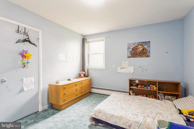 2400 Willow Glen Dr, Baltimore, MD 21209 - bedroom with a baseboard heating unit and carpet