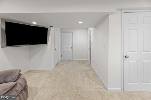 9761 Turnbuckle Dr, Burke, VA 22015 - unfurnished living room featuring light carpet, baseboards, and recessed lighting