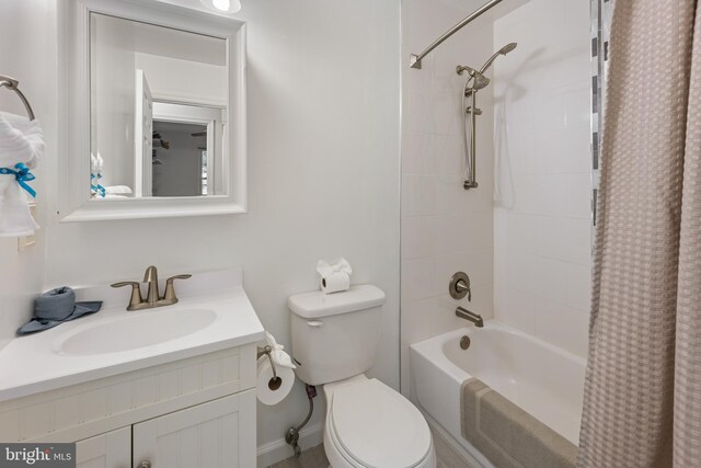 9761 Turnbuckle Dr, Burke, VA 22015 - bathroom featuring toilet, shower / bath combination with curtain, and vanity
