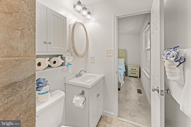9761 Turnbuckle Dr, Burke, VA 22015 - ensuite bathroom with vanity and toilet