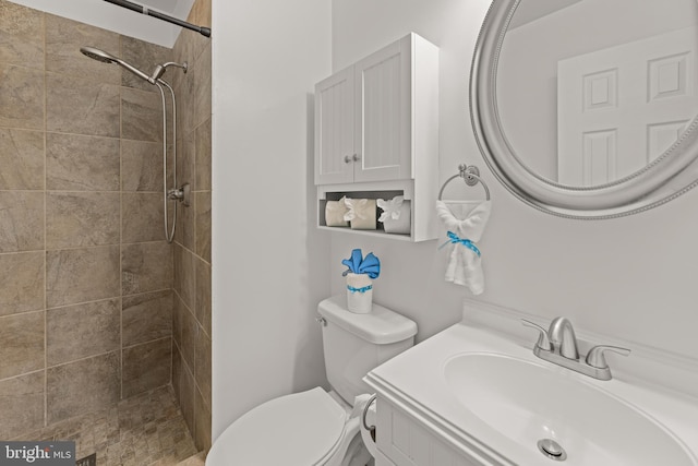 9761 Turnbuckle Dr, Burke, VA 22015 - bathroom featuring toilet, a tile shower, and vanity